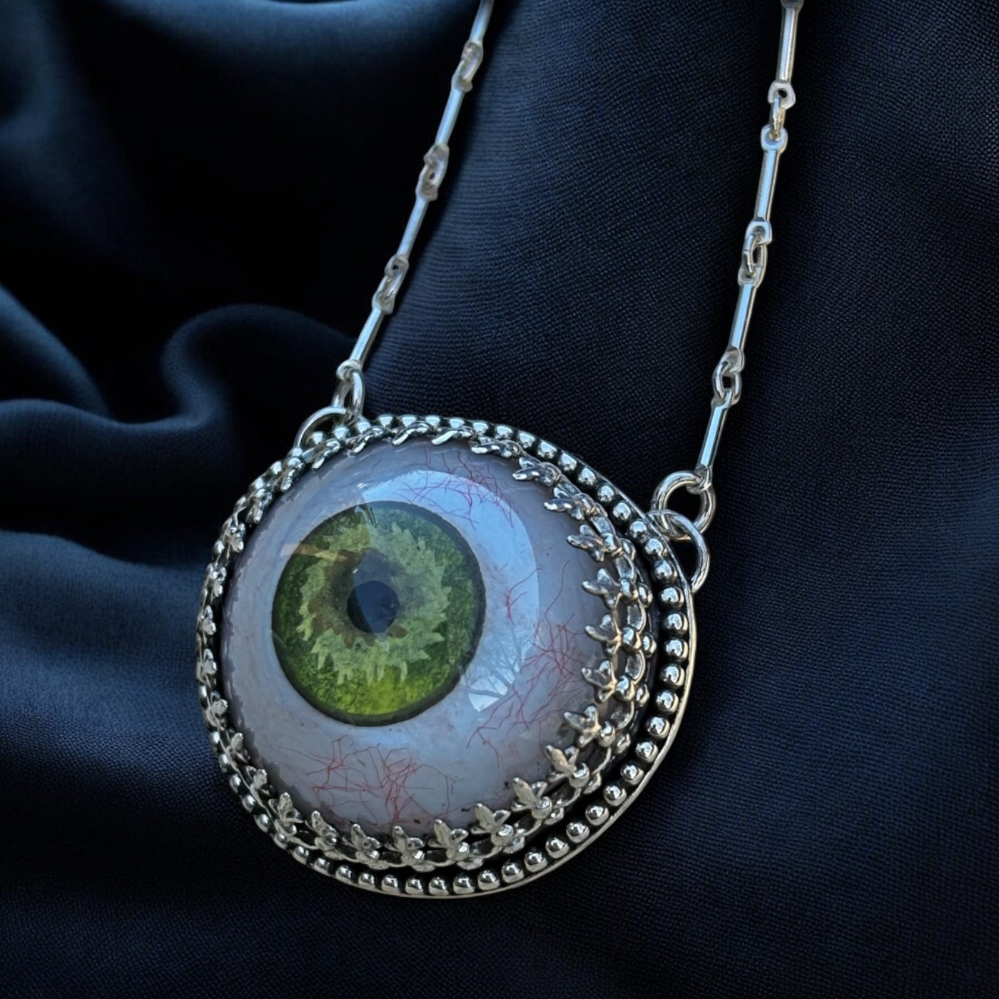 Eye see you~Hand crafted sterling & fine silver prosthetic green eye necklace ~