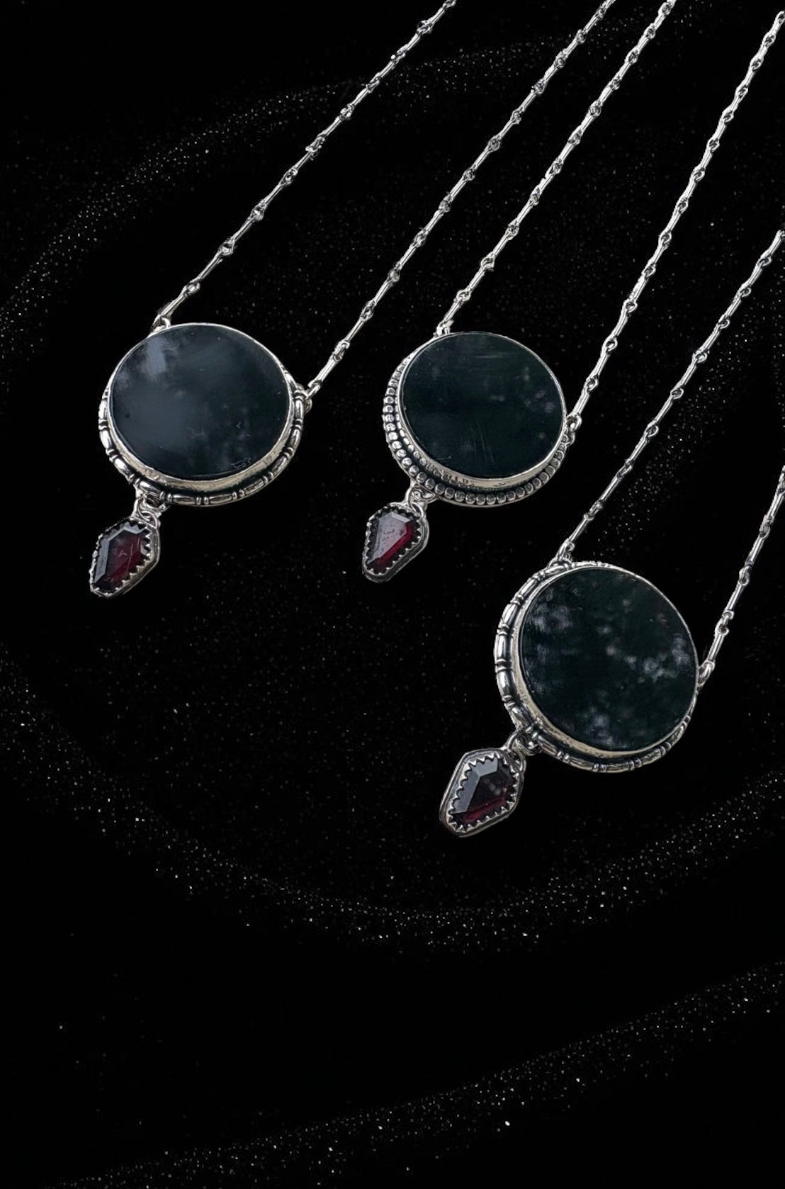 The Obsidian Veil-obsidian scrying mirror with coffin cut garnet Sterling silver necklace-