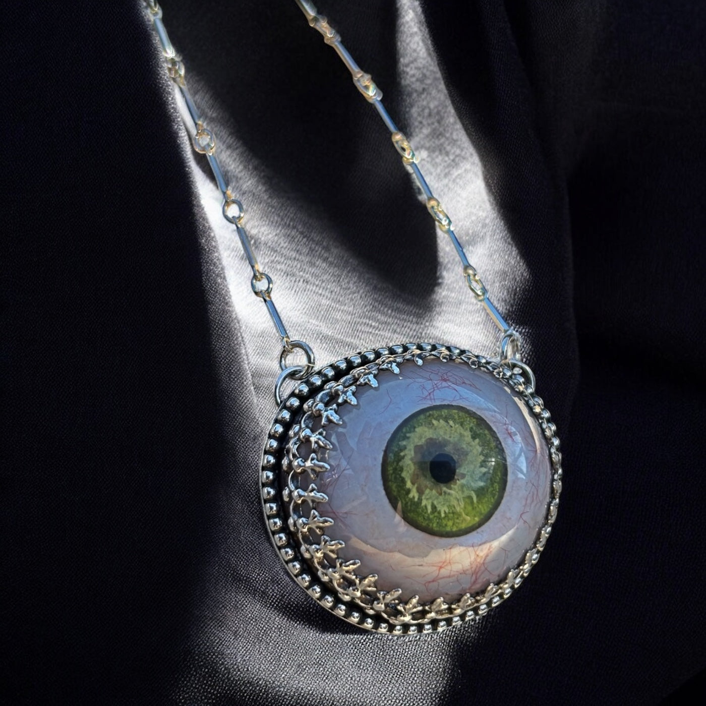 Eye see you~Hand crafted sterling & fine silver prosthetic green eye necklace ~
