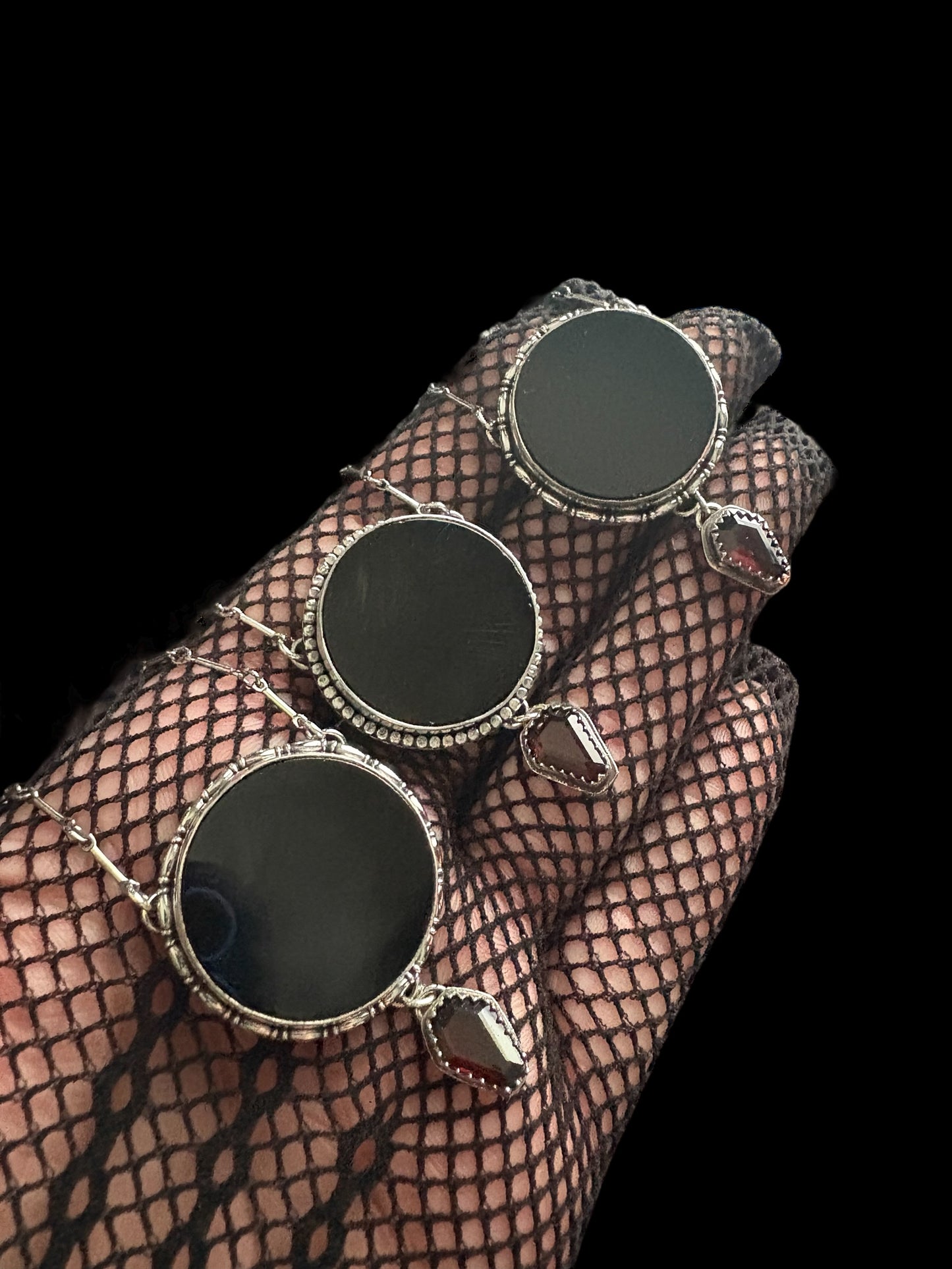 The Obsidian Veil-obsidian scrying mirror with coffin cut garnet Sterling silver necklace-