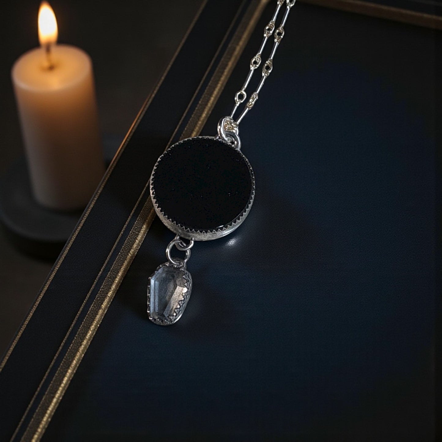 -The Unseen Pact -obsidian scrying mirror with reverse pentacle & ￼coffin cut clear quartz hanging setting Sterling silver necklace-